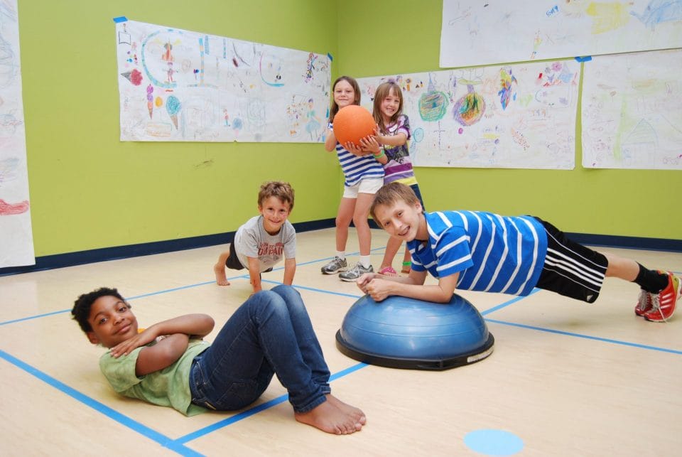 Kids exercising in the youth activity club