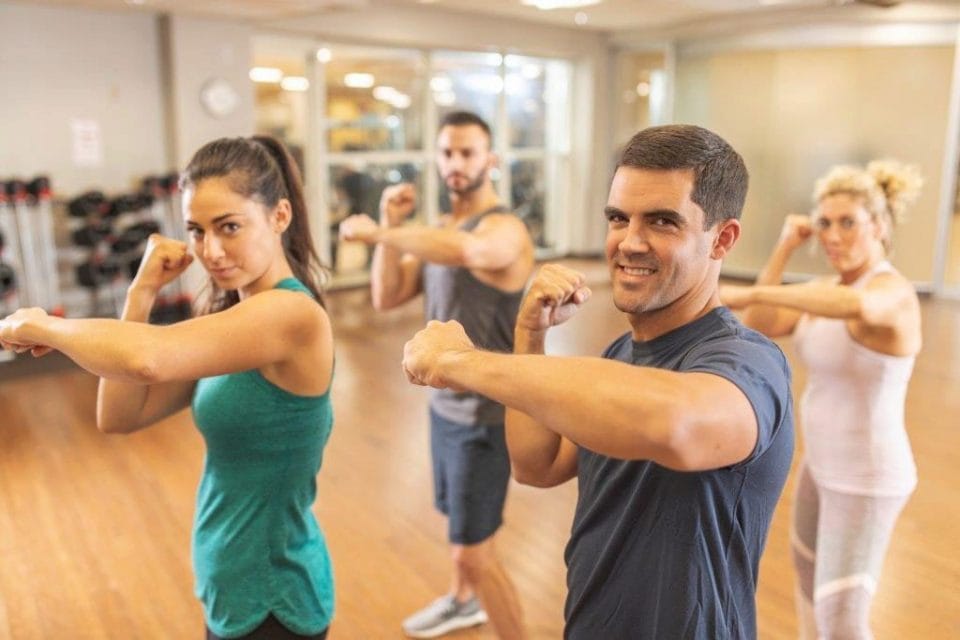 people during a group fitness class at Club Greenwood