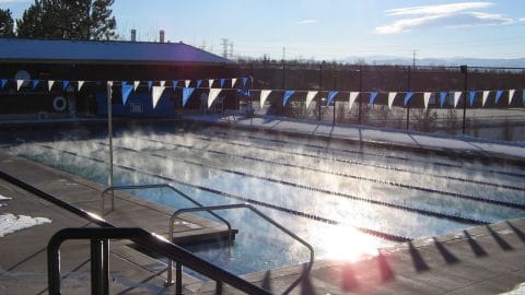 club greenwood heated outdoor pool in the winter with snow