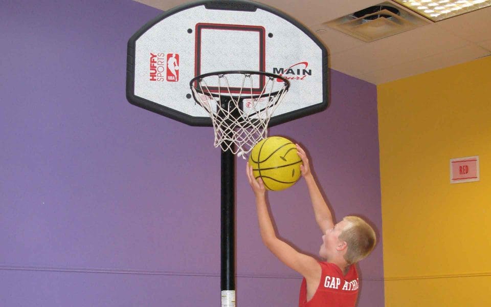 Kid playing basketball