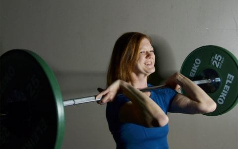 personal trainer kim galbreath lifting a dumbell