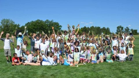 group of happy kids posing for photo