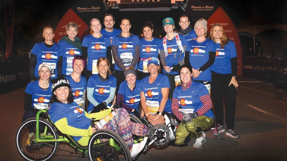 group of people smiling after team quest for ALS fundraiser run