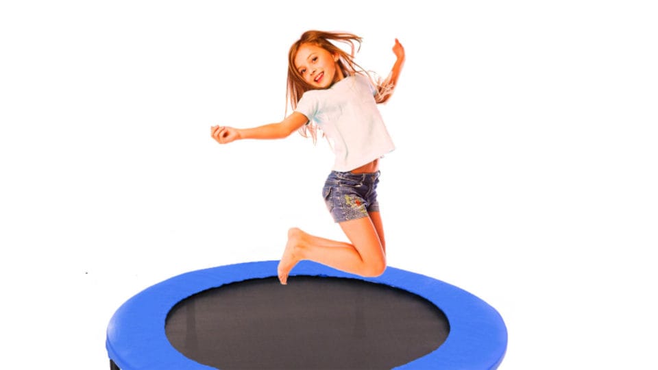 Girl jumping on a rebounder