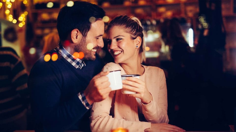 Couple having coffee out on a date