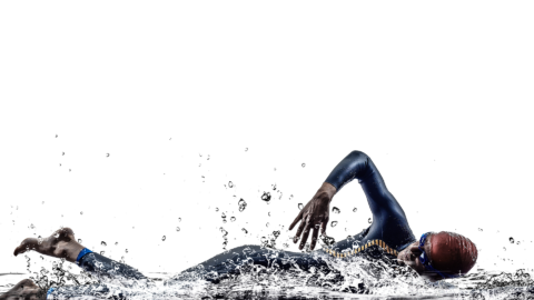 triathlete swimming with a white background