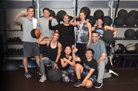Family fitness, family working out together, family showing their muscles