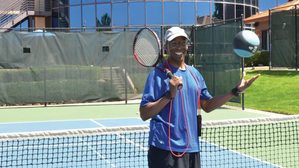 club greenwood personal trainer on a tennis court