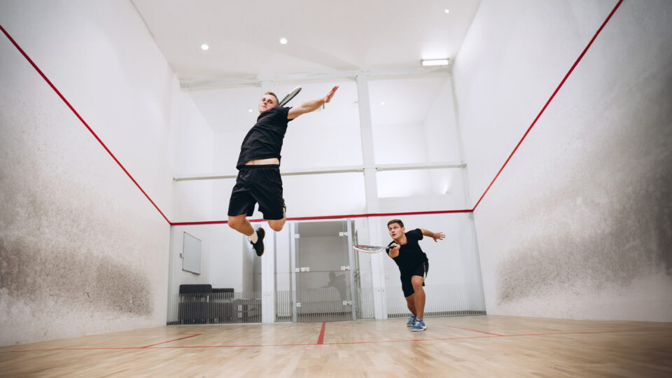 Junior Squash High School, two boys playing squash