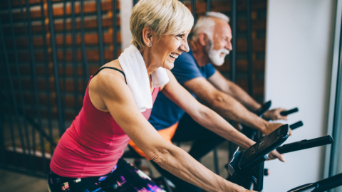 older people cycling indoors