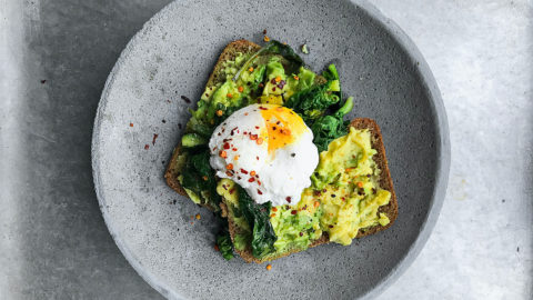 Avocado Toast on plate with egg