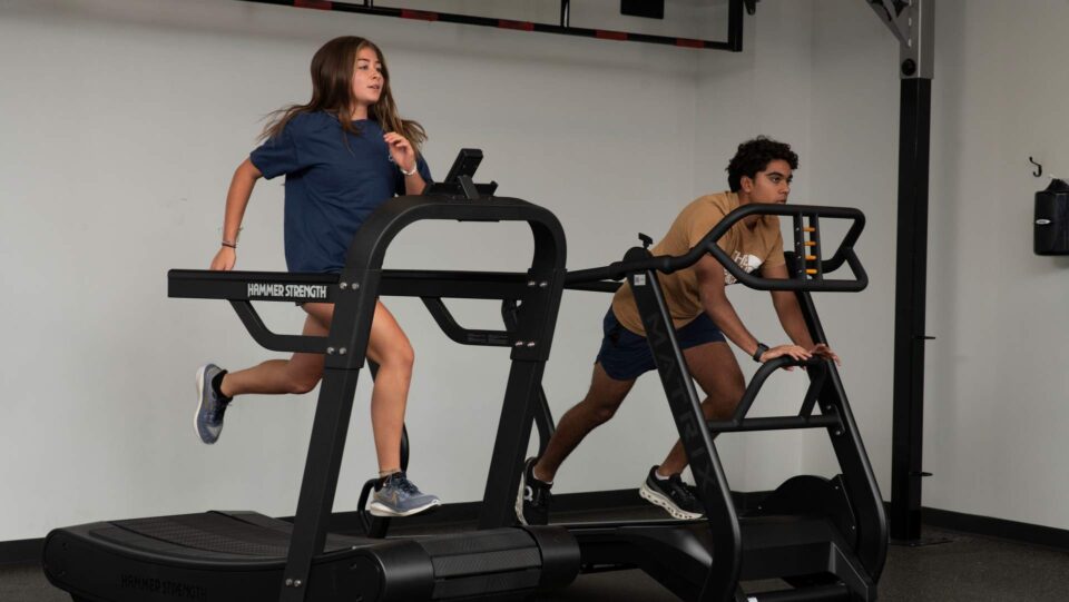 Kids on self powered treadmills