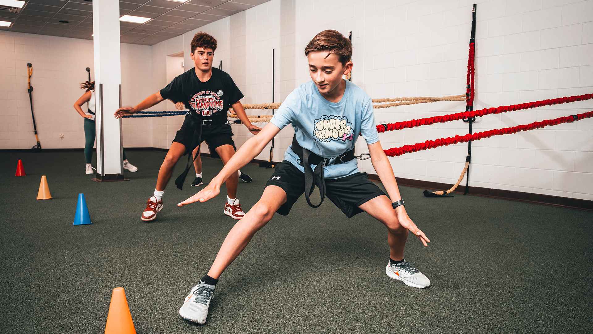 two boys running with bands