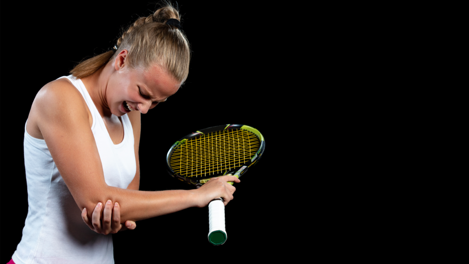women tennis player injured from tennis elbow
