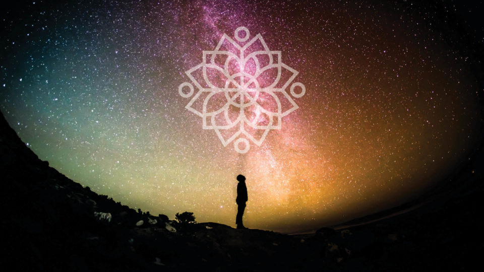 Galaxy photo with man looking up in the sky, mandala on top