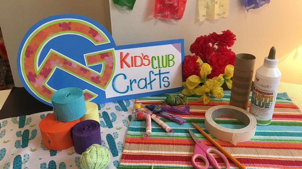 kids club crafts sign with color candy and decorations