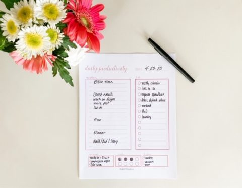 productivity list with a pen and color flowers