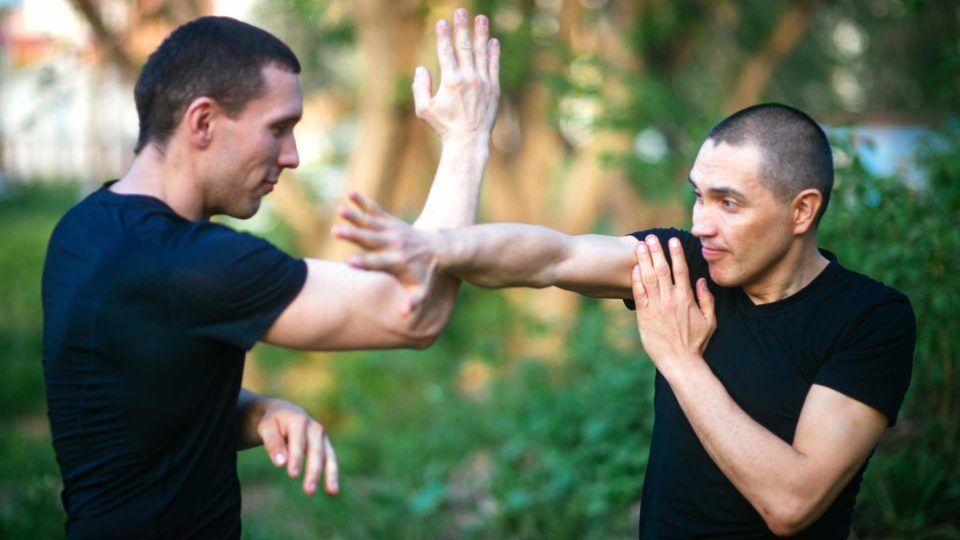 men practicing self defense